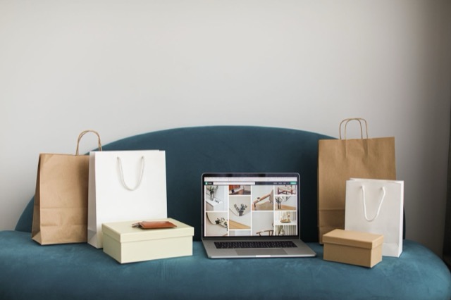 Photograph: laptop with shopping bags and boxes