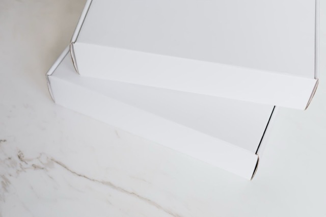 Photograph: sealed white boxes, subscription-box idea