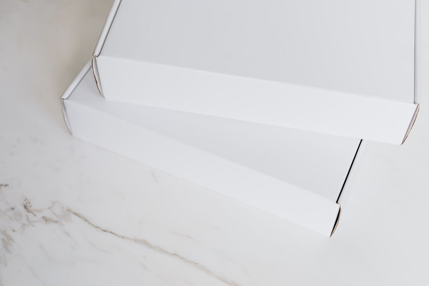 Photograph: sealed white boxes, subscription-box idea